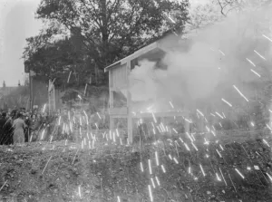 Preparation Prints: An Air Raid Precautions demonstration in Dartford, Kent. Incendiary bomb explosion