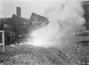 An Air Raid Precautions demonstration in Dartford, Kent. Incendiary bomb explosion
