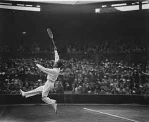 All French final at Wimbledon. Henri Cochet in play against Ren? Lacoste. 6