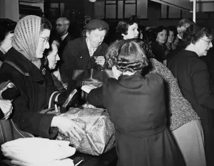 All-night queue for Dartford sales. Women queued from teatime on Sunday until 9 AM