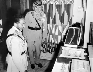 Ethiopia Prints: Amman, Jordon: Emperor Haile Selassie of Ethiopia admires a selection of gifts presented