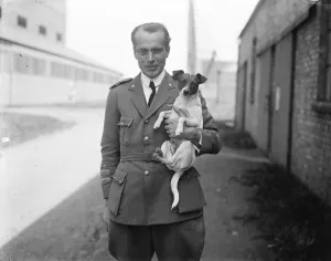 Amundsens airship Norge arrives at Pulham. Colonel Umberto Nobile and his dog Titina