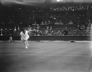 Anglso American battle of women tennis Stars at Wimbledon. Miss Browne in play