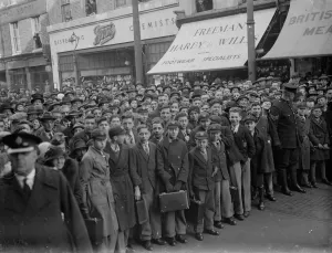 Uniforms Prints: Announcing the new King in Dartford. A crowd of people including many schoolboys