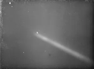 An anti aircraft display in Dartford, Kent. An aeroplane is caught by a searchlight