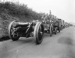 Manoeuvres Prints: The anti aircraft gun protects the big gun. An anti aircraft accompanies the Howitzer