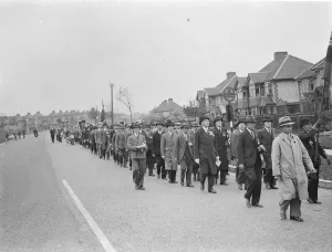 Armistice Memorial Service in Orpington, Kent. The British Legion marching through