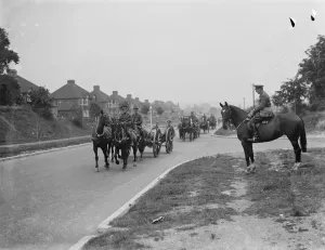 Army manoeuvers in Orpingon, Kent. Horses draw artillery pieces