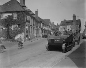 Military Prints: The army manoeuvres. Mechanised heavy artillery passing through picturesque Midhurst