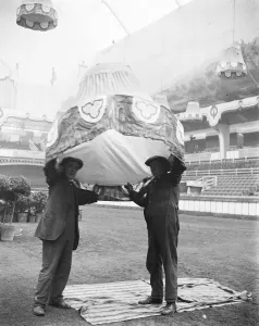 Not an Ascot Hat. Preparing for the International Horse Show at Olympia Two workmen