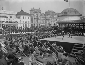 Holidaymakers Prints: At the bandstand on Hastings sea front on Easter Monday. 9 April 1928