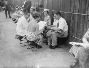 Bare Back In The Queue At Wimbledon A long queue wait for hours in hot sunshine