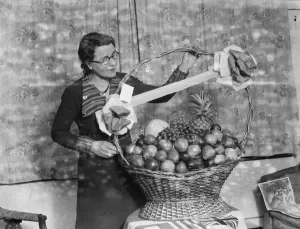 Money Prints: Basket of fruit raffled at the charity dance in Sidcup, Kent. 1936
