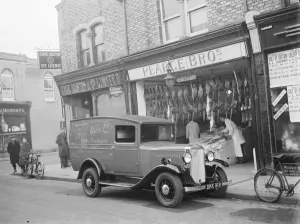 Bicycle Prints: A Bedford truck belonging to Pearce Bros Ltd, the fishmongers and poulterers, parked
