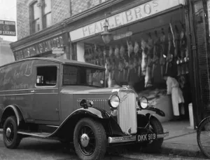 A Bedford truck belonging to Pearce Bros Ltd, the fishmongers and poulterers, parked