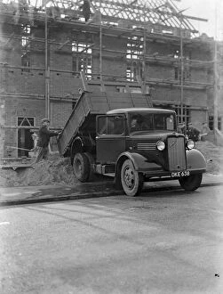 Scaffolding Collection: A Bedford truck tipping its load at a building site in Chislehurst, Kent
