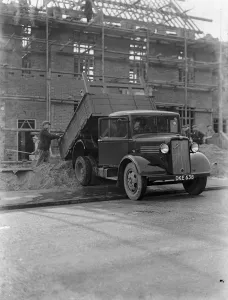 Construction Prints: A Bedford truck tipping its load at a building site in Chislehurst, Kent