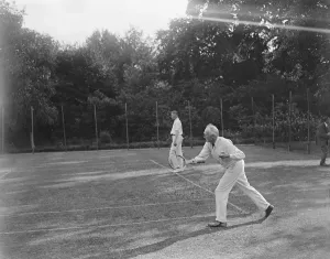 Sporting Prints: The Bishop of London plays tennis at Fulham Palace. 26 January 1922