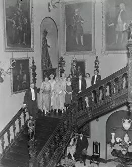Women Collection: At Blickling Hall, Aylsham, Norfolk, the famous staircase. 25 September 1925