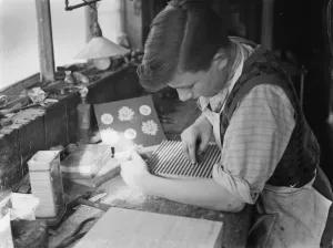 Cutting Prints: Block making in Wilmington, Kent. Master Alan F G Campbell finishing off a design