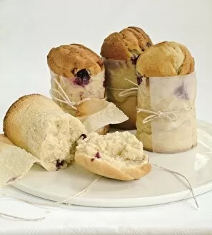 Berries Collection: Blueberry muffins made in talll paper cases of greaseproof paper tied with string credit