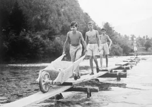 Boy king of Yugoslavia joins in the fun of camp life. King Peter, the boy monarch of Yugoslavia