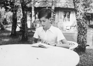 Boy king of Yugoslavia joins in the fun of camp life. King Peter, the boy monarch of Yugoslavia