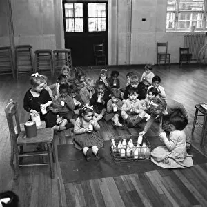 Drink Collection: During a break in the days activities these infants at Jessop Primary School