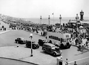 Crowd Collection: Brighton The Promenade looking East, showing the entrance to the Palace Pier