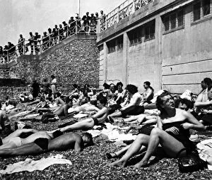 Holiday Collection: Brighton Sunbathing on the beach 20 June 1954