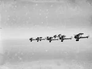 Bristol Bulldogs fighters of No 32 Squadron in formation flying over Biggin Hill