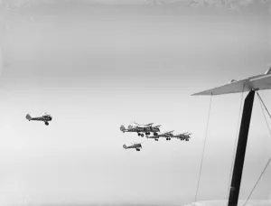 Bristol Bulldogs fighters of No 32 Squadron in formation flying over Biggin Hill