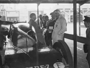 The British Empire Trophy Race. Three famous racing drivers chatting together in