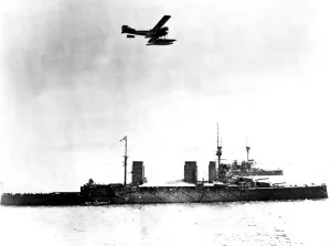 Aircraft Prints: British seaplane circling British warships circa 1916