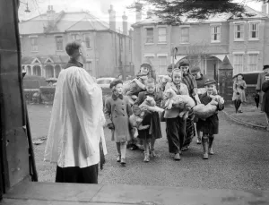Bromley, Kent The Rev John Rahe Hughes, Vicar of St Marys Church, Bromley, stands