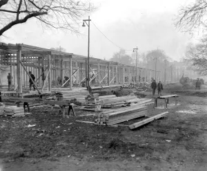 Post Office Prints: Building the temporary structure for the Army Parcels Office in Regents Park. 1914