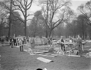 Building a town for Coronation troops in Kensington Gardens. Of wood and canvas