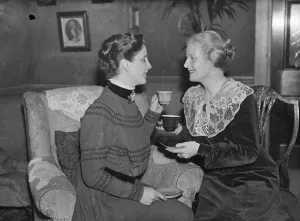 The two candidas Ann Harding wishes successor good luck in Shaw Play. In the costume