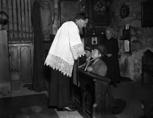 Christian Prints: Candlemass ceremony at St Etheldredas Church, Holborn, London. Father McGinn
