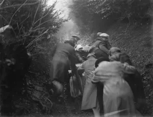 The car trials in Wrotham, Kent. One of the drivers gets a helping hand. 1939