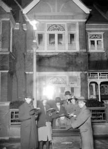 Cold Prints: Carol singing by the members of the Southfields Wesleyan Church in aid of the National