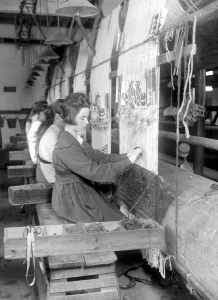 Carpet Prints: Carpet making at Wilton. Weaving a handmade real Axminster carpet. 1 November 1920