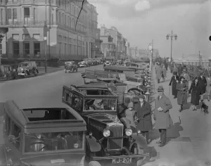 Cars parked along the front at Brighton. 27 March 1932