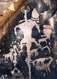 Paranormal Collection: CAVE ART. Pictograph of a lizard-man carved by shamans or indian artists, on the
