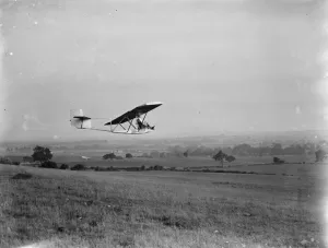 Plane Prints: A Cessna CG-2 Glider is flown by its pilot. 1936