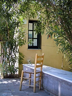 Tourist Collection: Chair and marble counter outside entrance to Asclepieion, Kos Greece credit: Marie-Louise