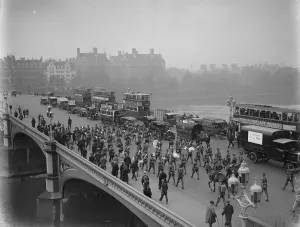 The change over of the guards. The band of the 2nd Scots Guards passing over Westminster Bridge