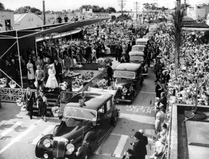 Royal Prints: To the cheers of the tightly packed crowds, Queen Elizabeth II leaves the dais with