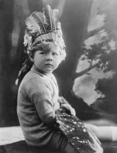 Headdress Prints: Chief of the Balkan Red Indians. A pretty study of Prince Michael of Romania