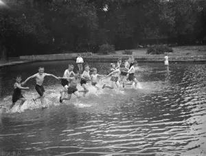 Children bath in the ponds in, Central Park Dartford. 1938